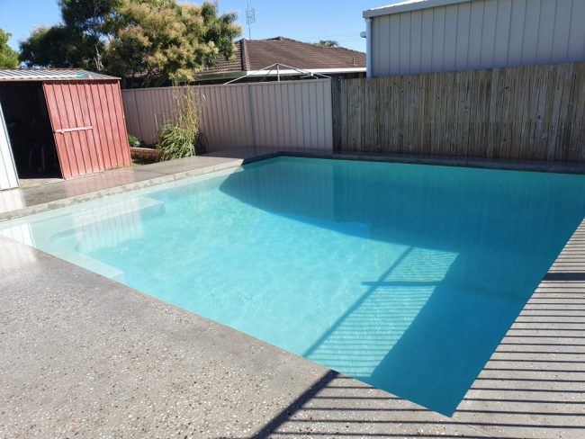 swimming pool polished concrete surround sunshine coast builder