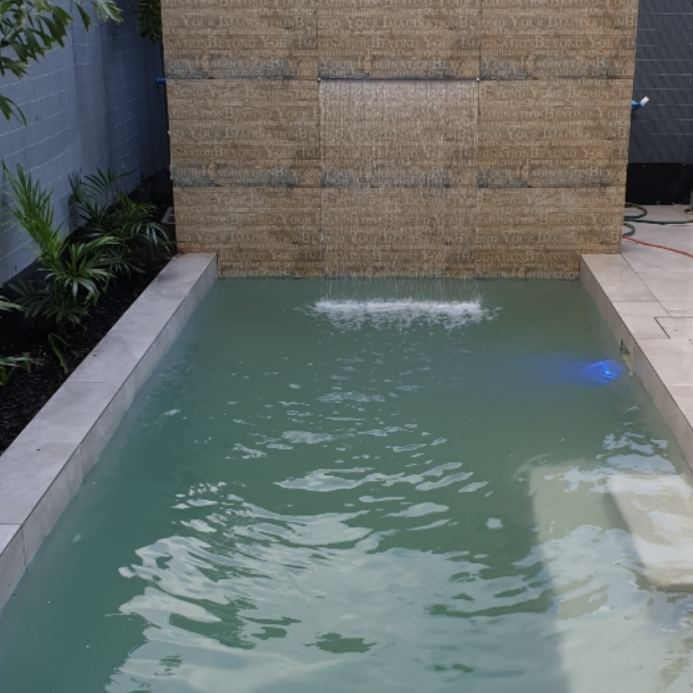 pool with water feature build noosa