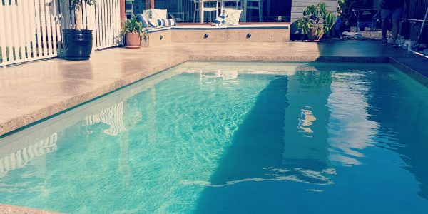 pool and polished concrete surrounds build sunshine coast
